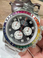 Rolex Daytona watch with black dial, three subdials, jeweled bezel, steel bracelet