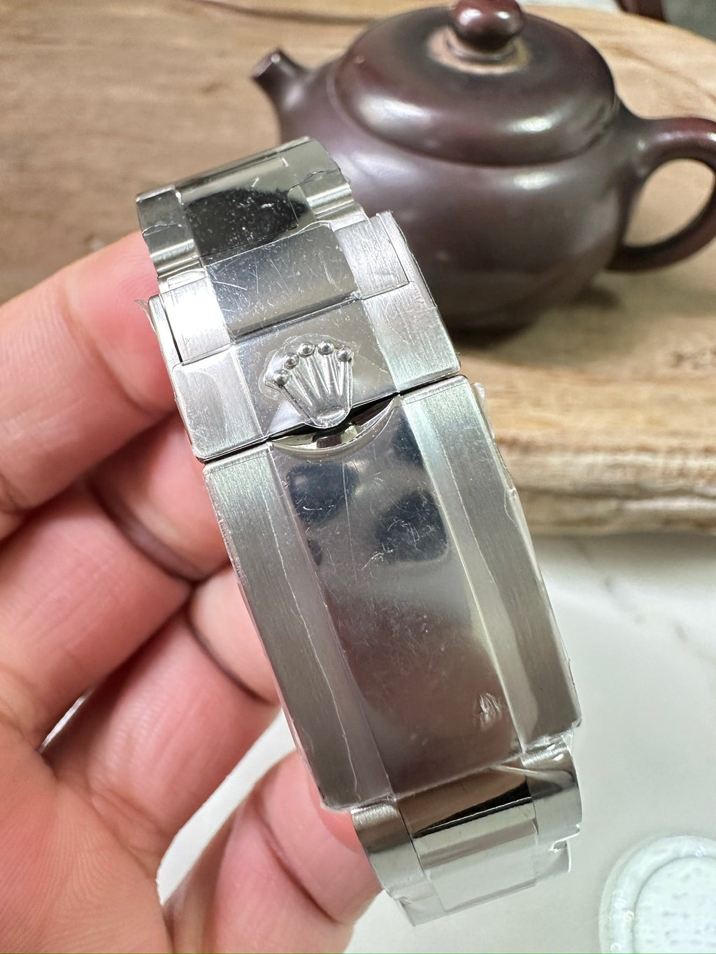 Rolex watch clasp and bracelet links in stainless steel finish