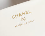 Chanel logo mark with “MADE IN ITALY” on white leather label