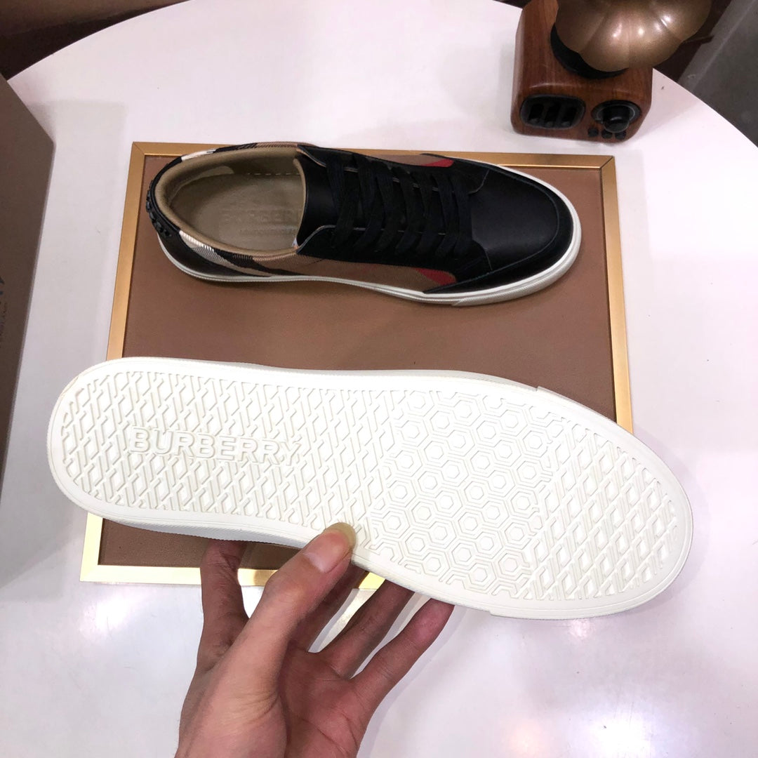 Burberry sneaker outsole, textured white rubber sole with patterned tread and logo.