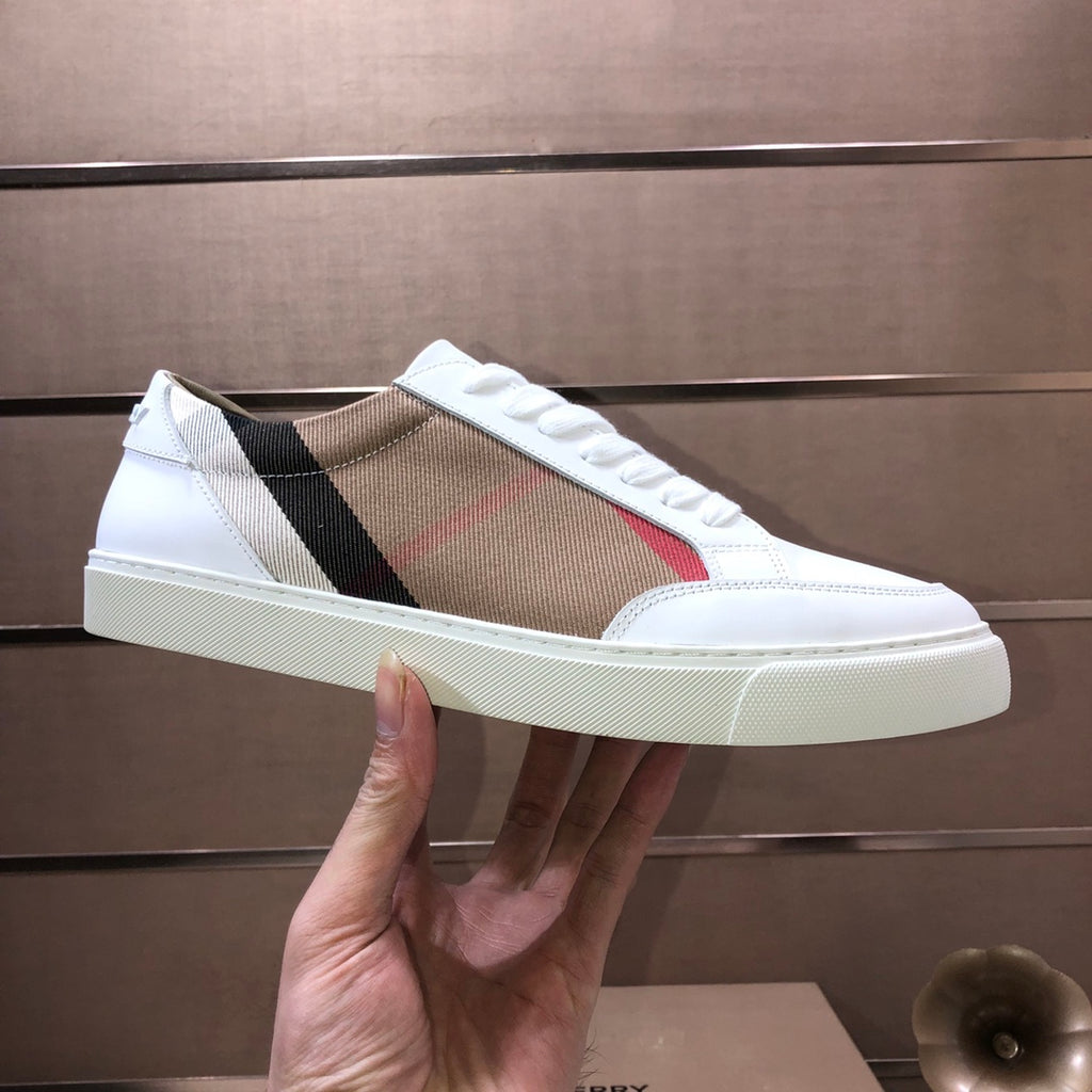 Burberry low-top sneakers, white with tan check panel and black stripe, front view