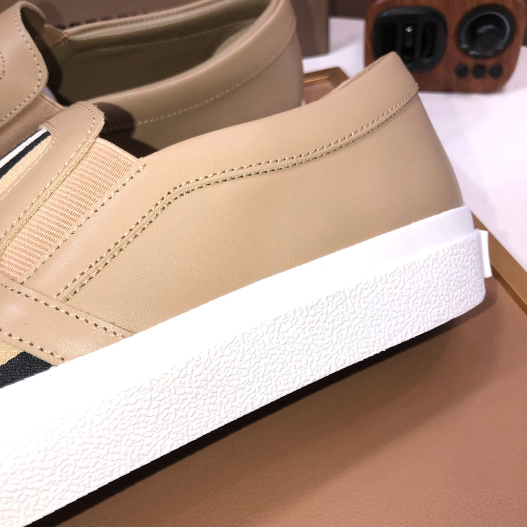 Beige slip-on sneaker with smooth upper and textured white sole