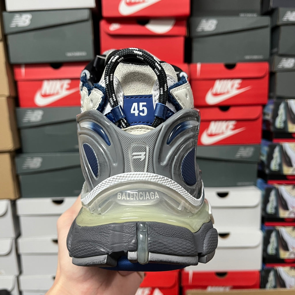 Balenciaga unisex running shoes, rear view with size tag '45' and blue accents