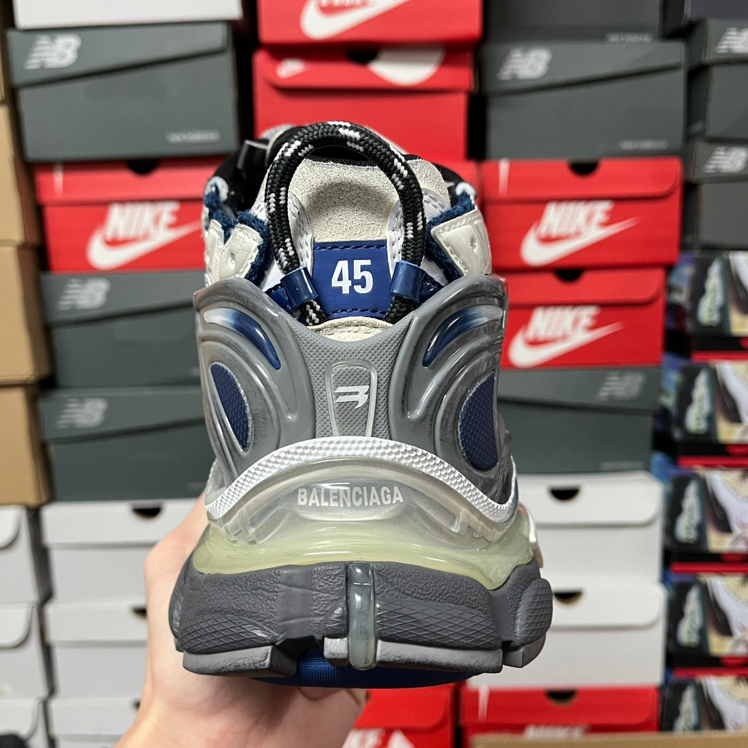 Balenciaga unisex running shoes, rear view with size tag '45' and blue accents
