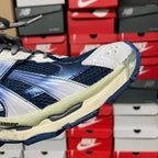 Balenciaga unisex running shoes, navy upper with white toe cap and pale sole