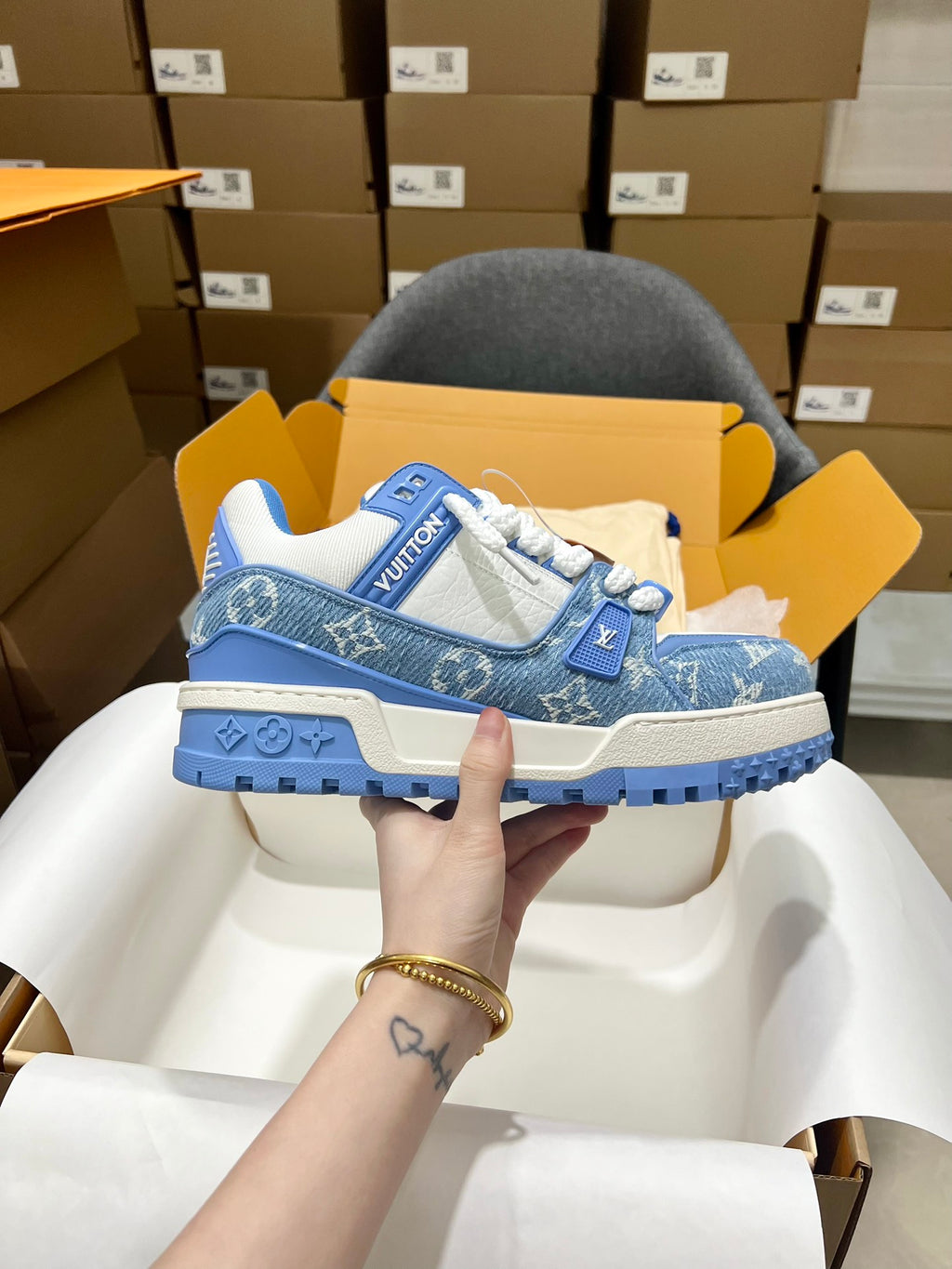 Louis Vuitton blue monogram lace-up trainer shoe with logo patch and chunky tread sole