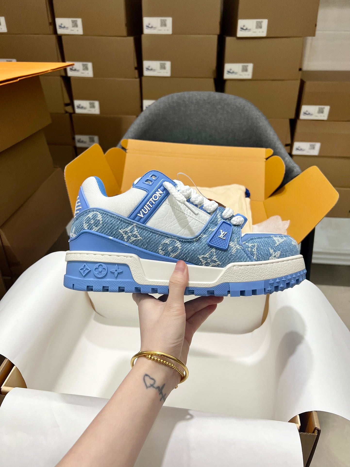 Louis Vuitton blue monogram lace-up trainer shoe with logo patch and chunky tread sole