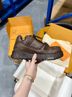 Louis Vuitton lace-up trainer shoe in dark brown with logo details and chunky tread sole