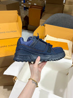 Louis Vuitton blue denim lace-up trainer shoe with logo patches and chunky tread sole