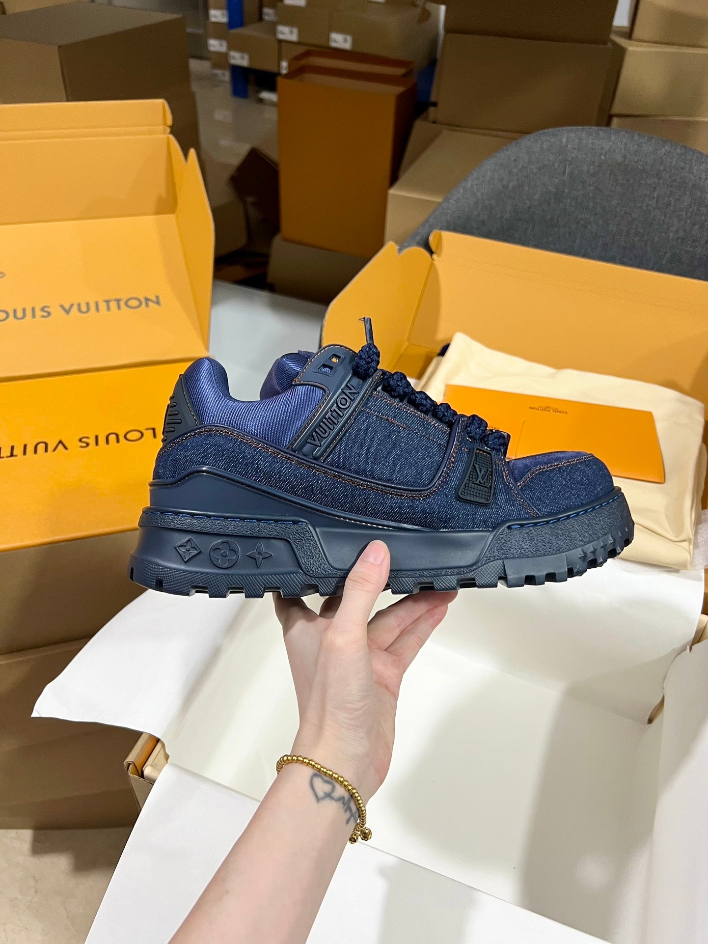 Louis Vuitton blue denim lace-up trainer shoe with logo patches and chunky tread sole