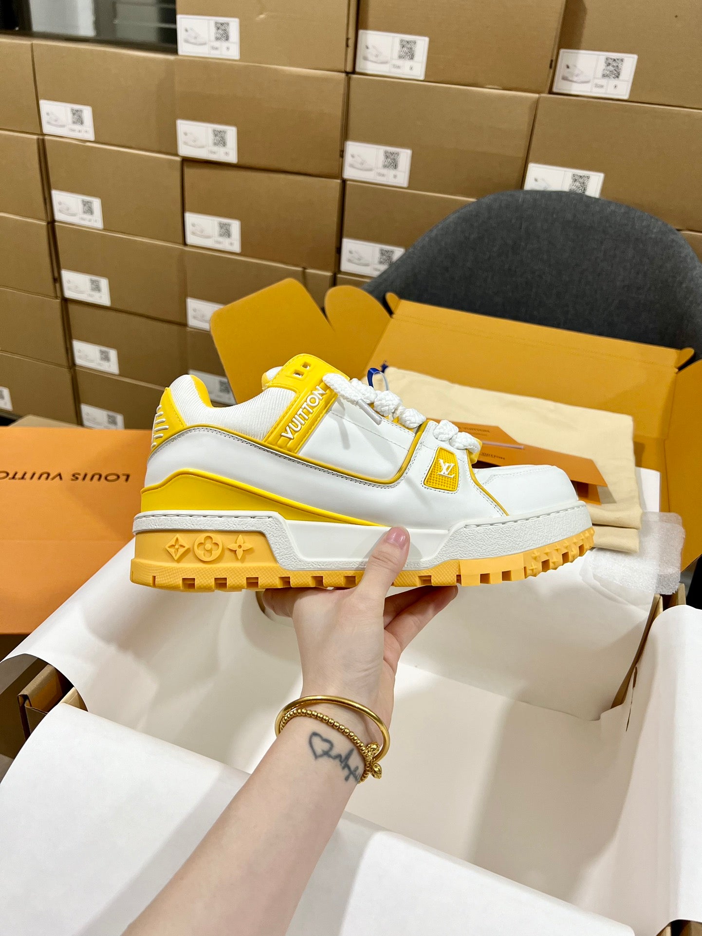 White and yellow trainer sneakers with monogram strap and rugged chunky sole