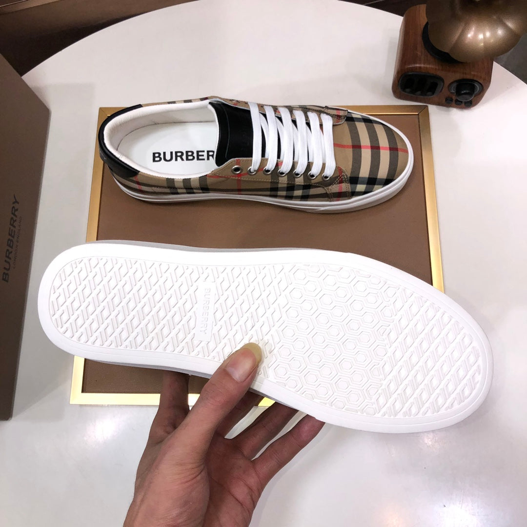 Burberry sneaker sole and side view, white textured outsole and plaid upper
