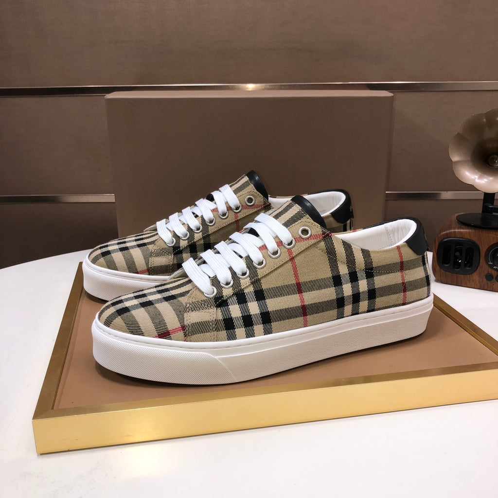 Burberry low-top sneakers in beige, black, and red check plaid with white laces