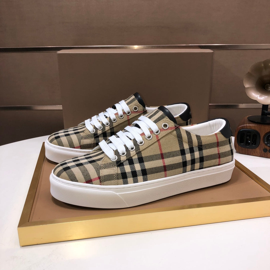 Burberry low-top sneakers in beige, black, and red check plaid with white laces