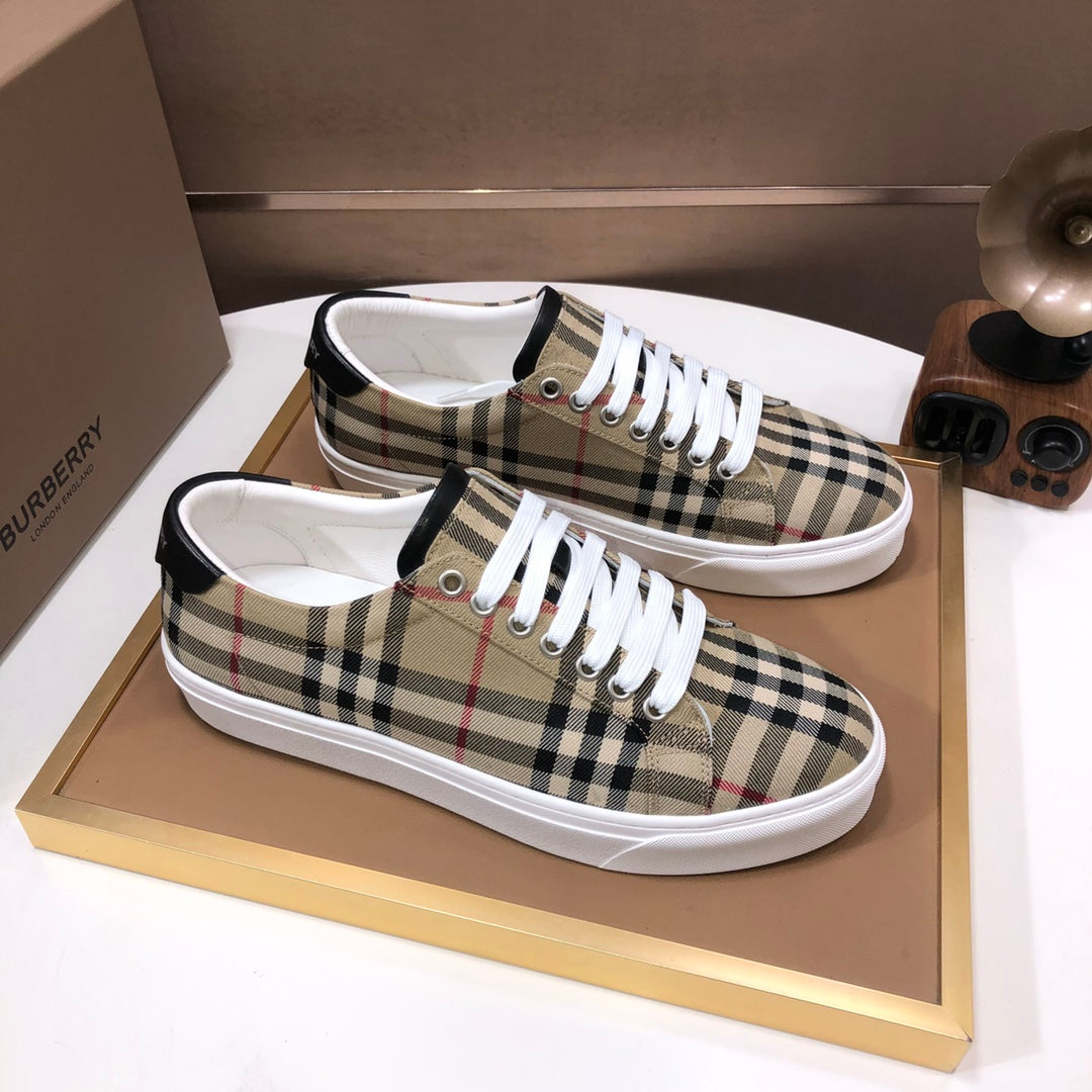 Burberry plaid canvas sneakers on box, white rubber sole and metal eyelets