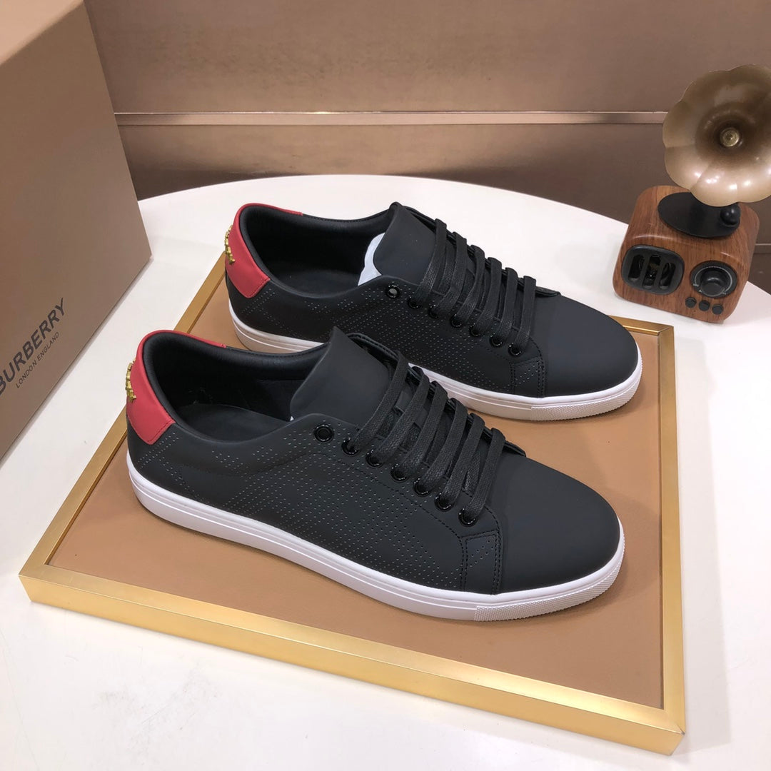 Burberry dark leather low-top sneakers with red heel stripe, lace-up