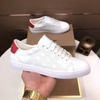 Burberry white sneakers with red heel tab, perforated pattern, lace-up front