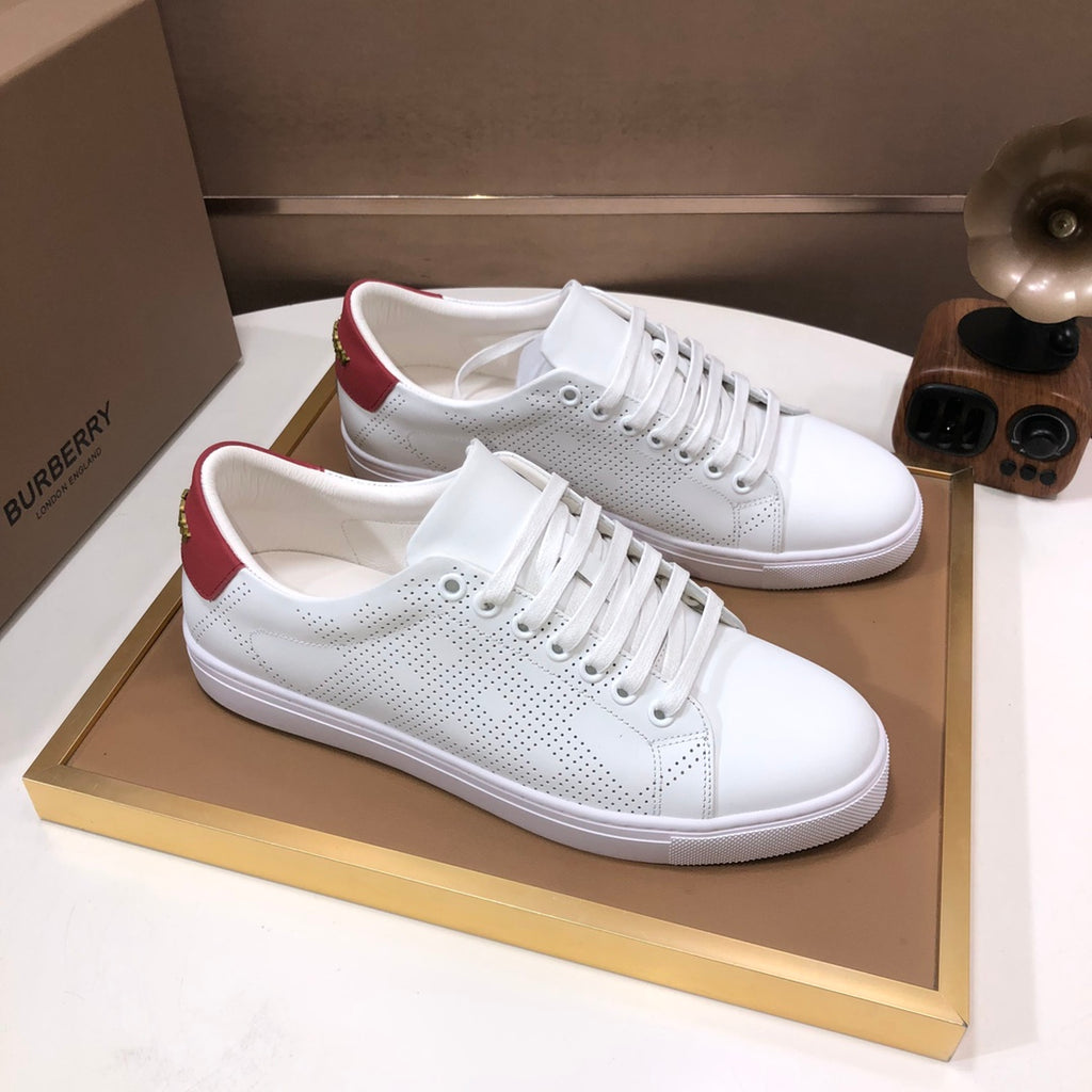 Burberry white lace-up sneakers with red heel panels and perforated upper