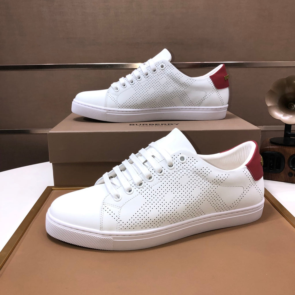 Burberry white low-top sneakers with perforated dots and red heel tabs
