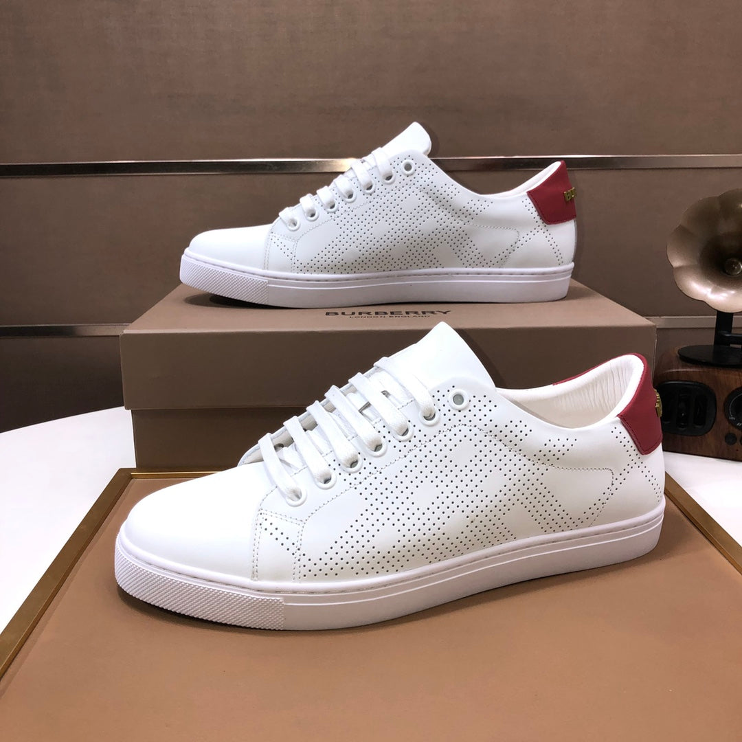 Burberry white low-top sneakers with perforated dots and red heel tabs