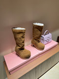 Suede shearling-lined knee-high boots, tan, with thick ridged sole