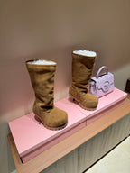 Suede shearling-lined knee-high boots, tan, with thick ridged sole