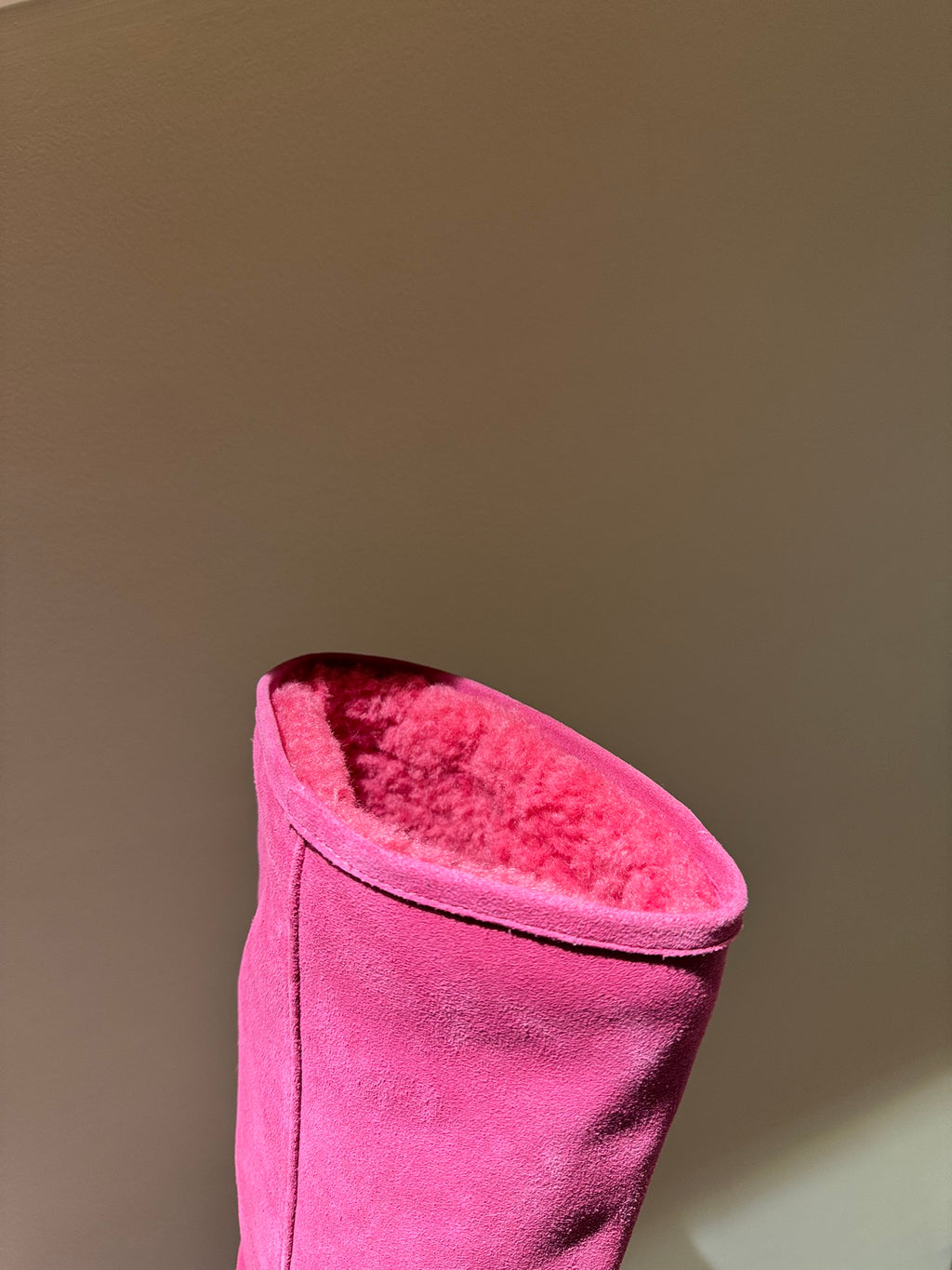Women's Balenciaga magenta suede boot with open top and plush shearling lining