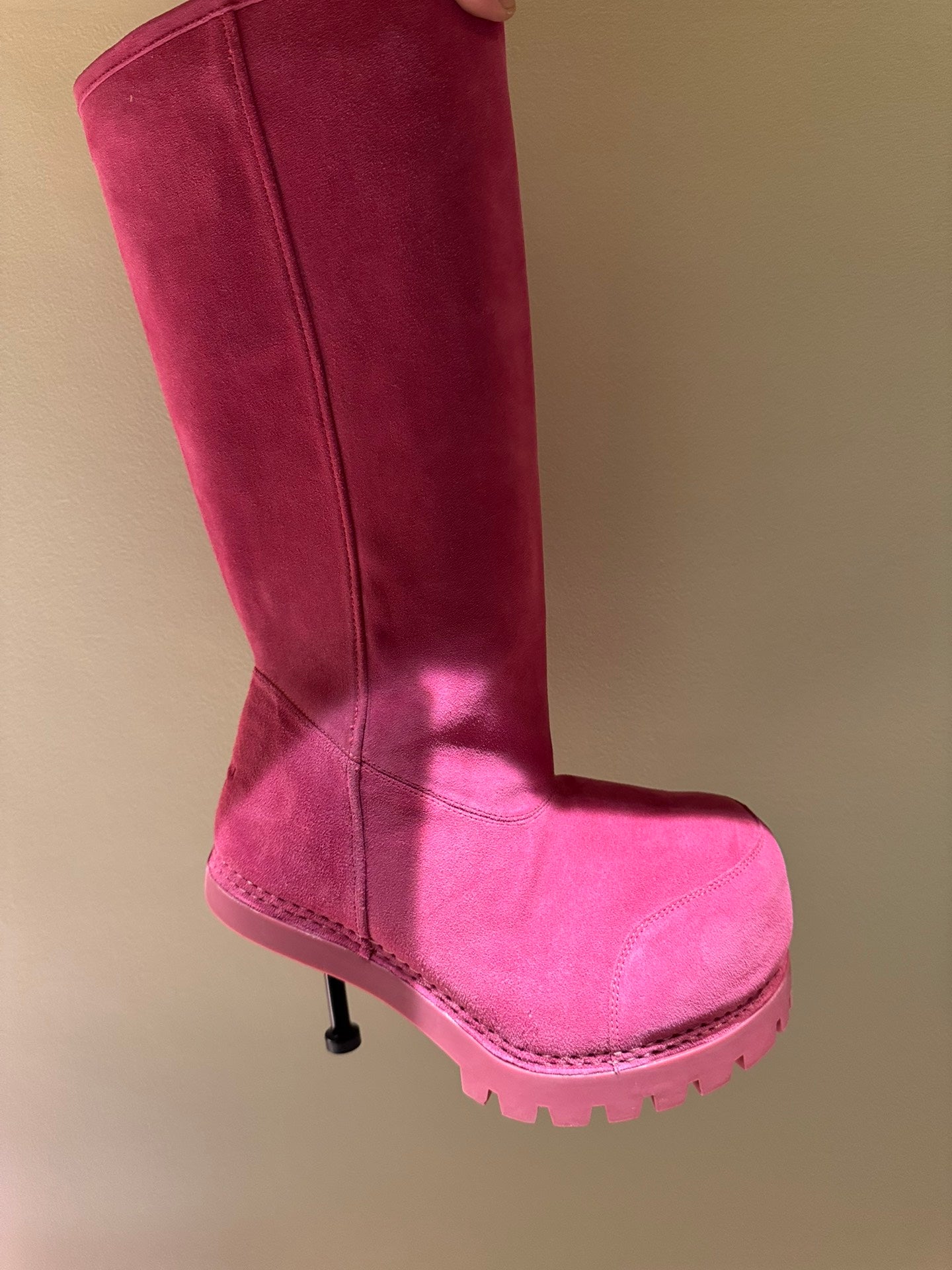 Women's Balenciaga magenta suede boots, side profile with low heel and lug sole