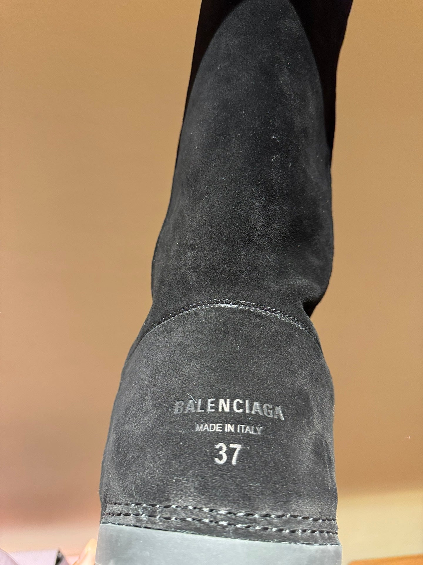 Black suede boot with BALENCIAGA label and size 37 marking