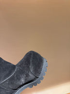 Grey suede ankle boot with side seam and rubber tread sole
