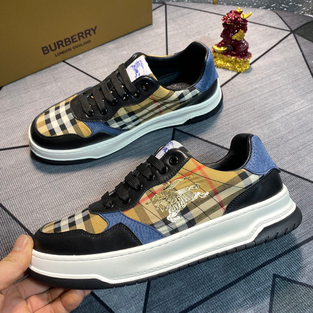 Burberry lace-up sneakers with black toe, plaid fabric panel, gold emblem patch, blue collar