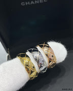 Gold and silver tone textured band rings stacked together