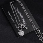Heart locket and cross pendant necklace with chain, silver tone
