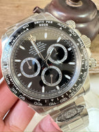 Steel chronograph watch with black dial, three subdials and silver-tone bezel