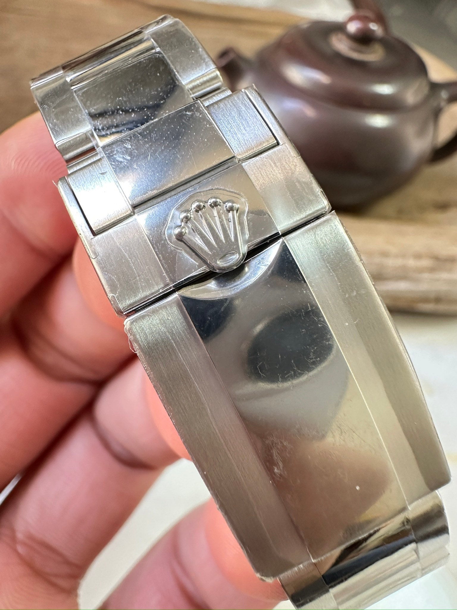 Stainless steel watch bracelet clasp with engraved logo