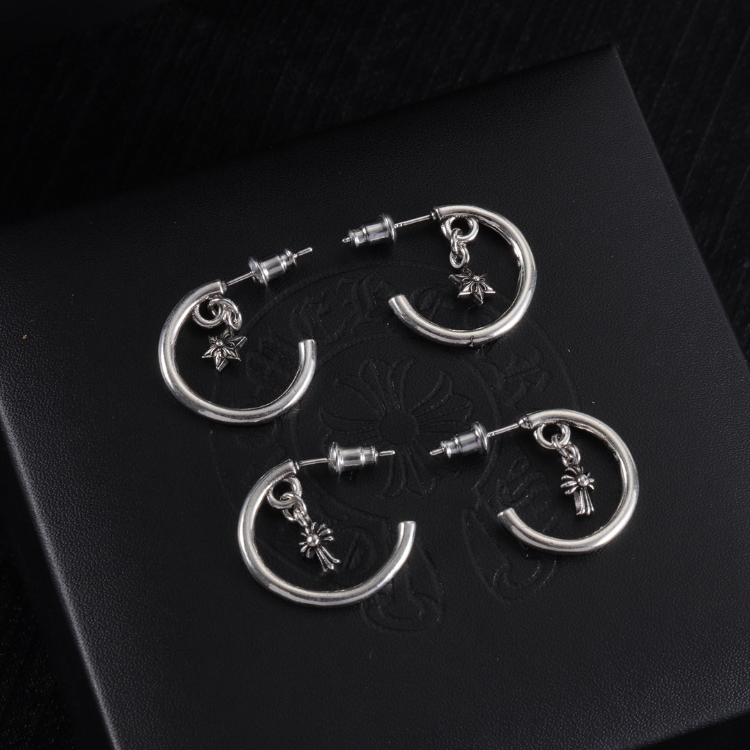 Silver hoop earrings with star charm and stud backing, circular silhouette