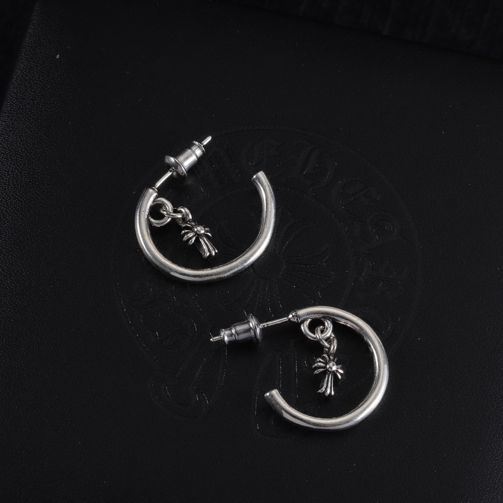 Silver hoop earrings with star charms and straight posts, pair view
