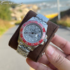 Rolex GMT-Master watch on brown cushion, steel bracelet, light dial, pink-red bezel