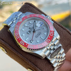 Rolex GMT-Master watch face, steel case, light dial, pink-red bezel, hour markers