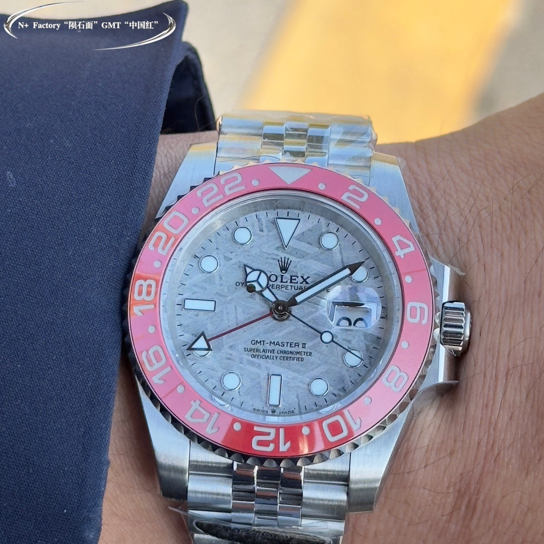 Rolex GMT-Master watch face, steel bracelet, light dial, pink-red bezel, GMT hands