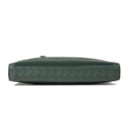 Montblanc men's green patterned bag side detail with zipper track and leather strap tab