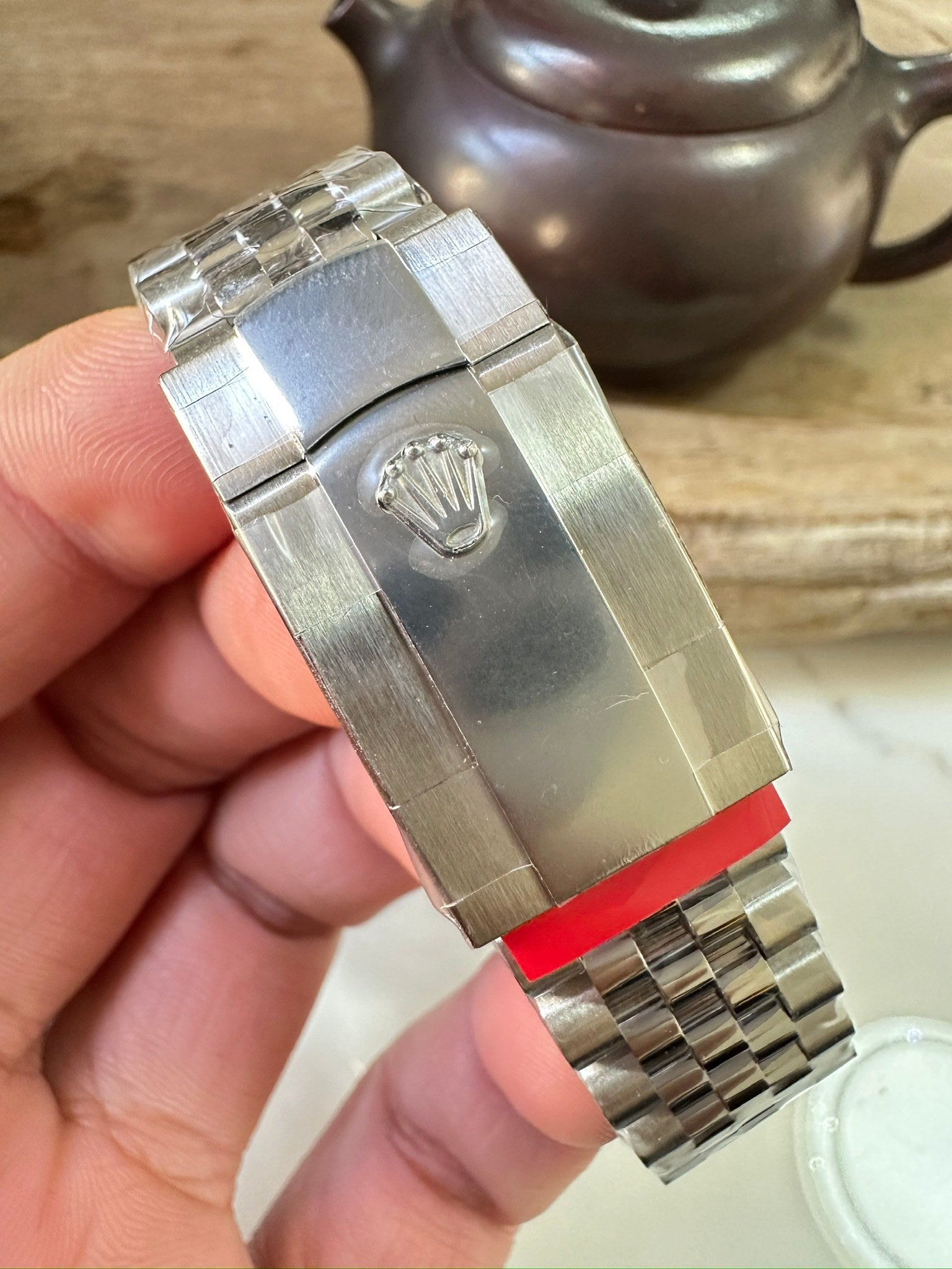Stainless steel watch bracelet and clasp, engraved crown emblem, brushed finish