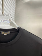 Black long-sleeve T-shirt neckline close-up