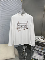 White long-sleeve T-shirt with Versace logo and charm graphic