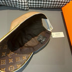 Louis Vuitton monogram baseball cap underside view, dark lining with label