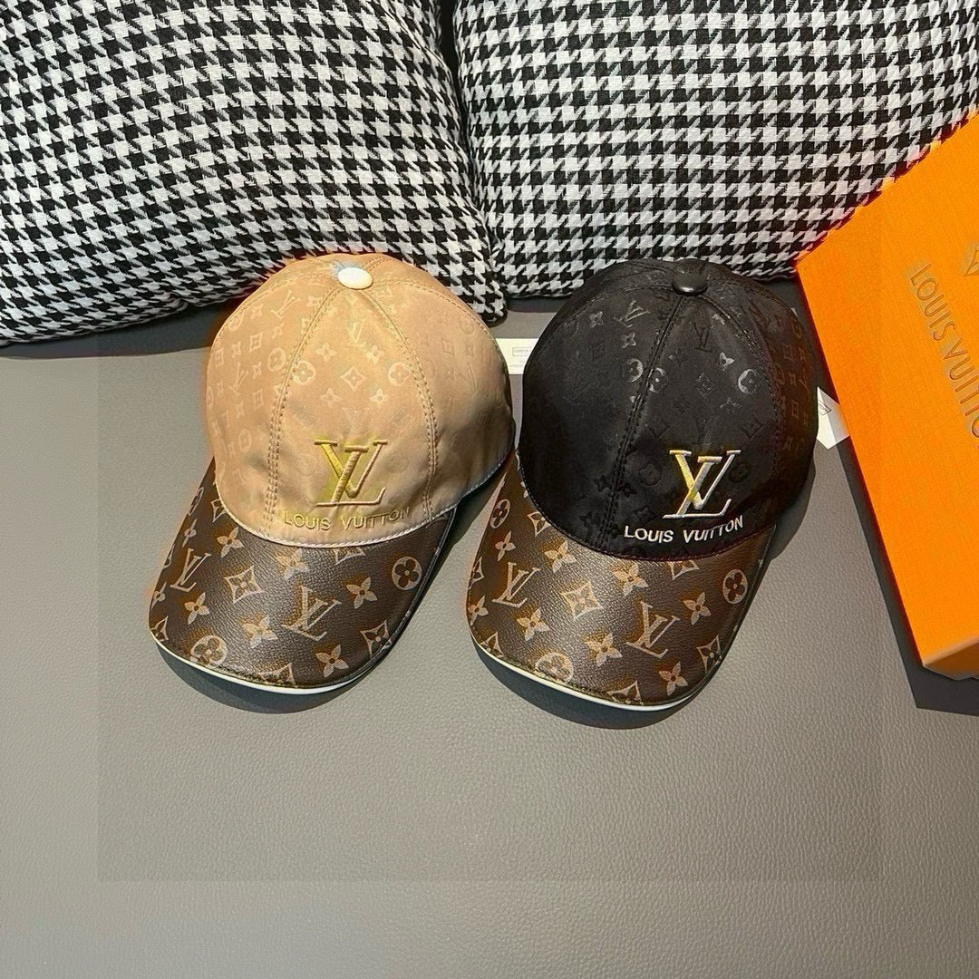 Pair of Louis Vuitton monogram baseball caps, tan and dark with gold LV logos