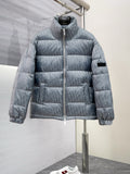 Long puffer jacket in light gray-blue with hood and full front zipper