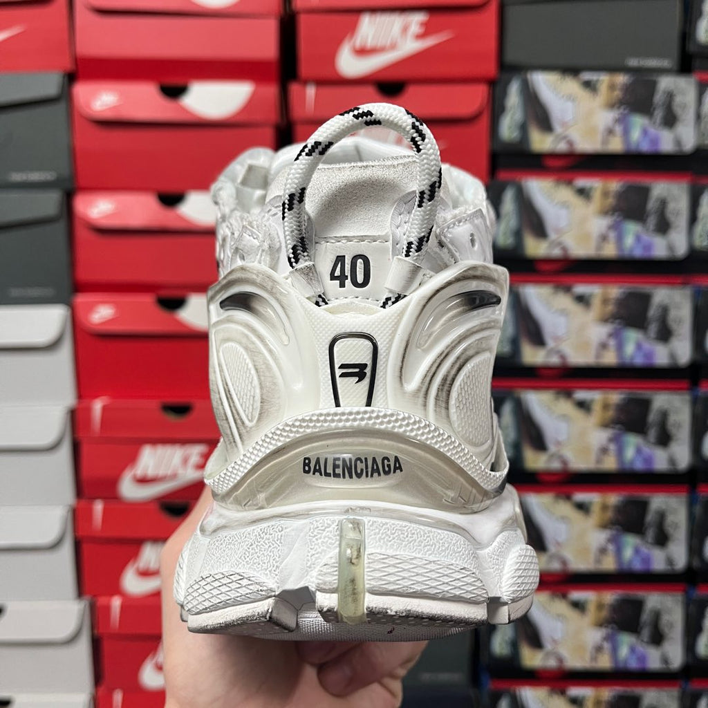 Unisex white sneaker rear view with size tag 40 and BALENCIAGA heel logo