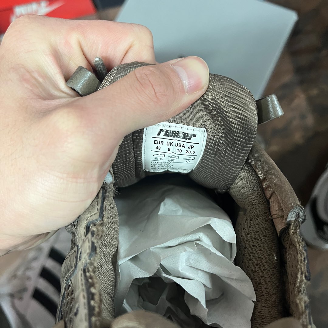 Balenciaga unisex shoes, inside size label showing UK 10 and US 9.5 on olive lining