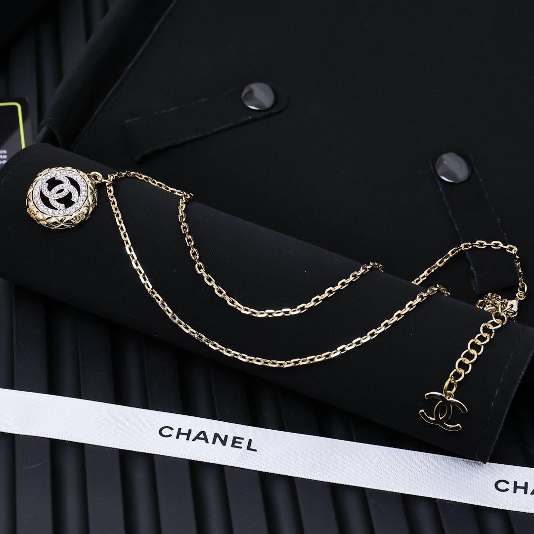Gold-tone Chanel pendant necklace with round CC charms and layered chain
